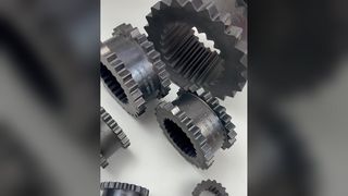 Manga de engranaje de goma